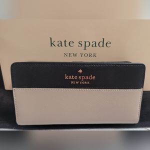 Authentic Kate Spade Wallet,  brand new with tags, raised branding logo
